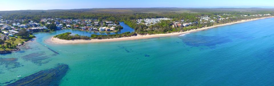 Drone view of Currarong village and Warrain Beach